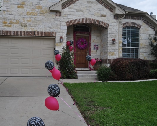 White/Damask and Hot Pink Balloons lined the driveway in front of the house.