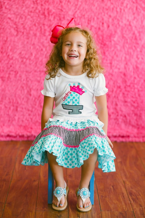 I embroidered the shirt and made the skirt. Can't even tell you how much fabric is in that skirt with all the ruffles!